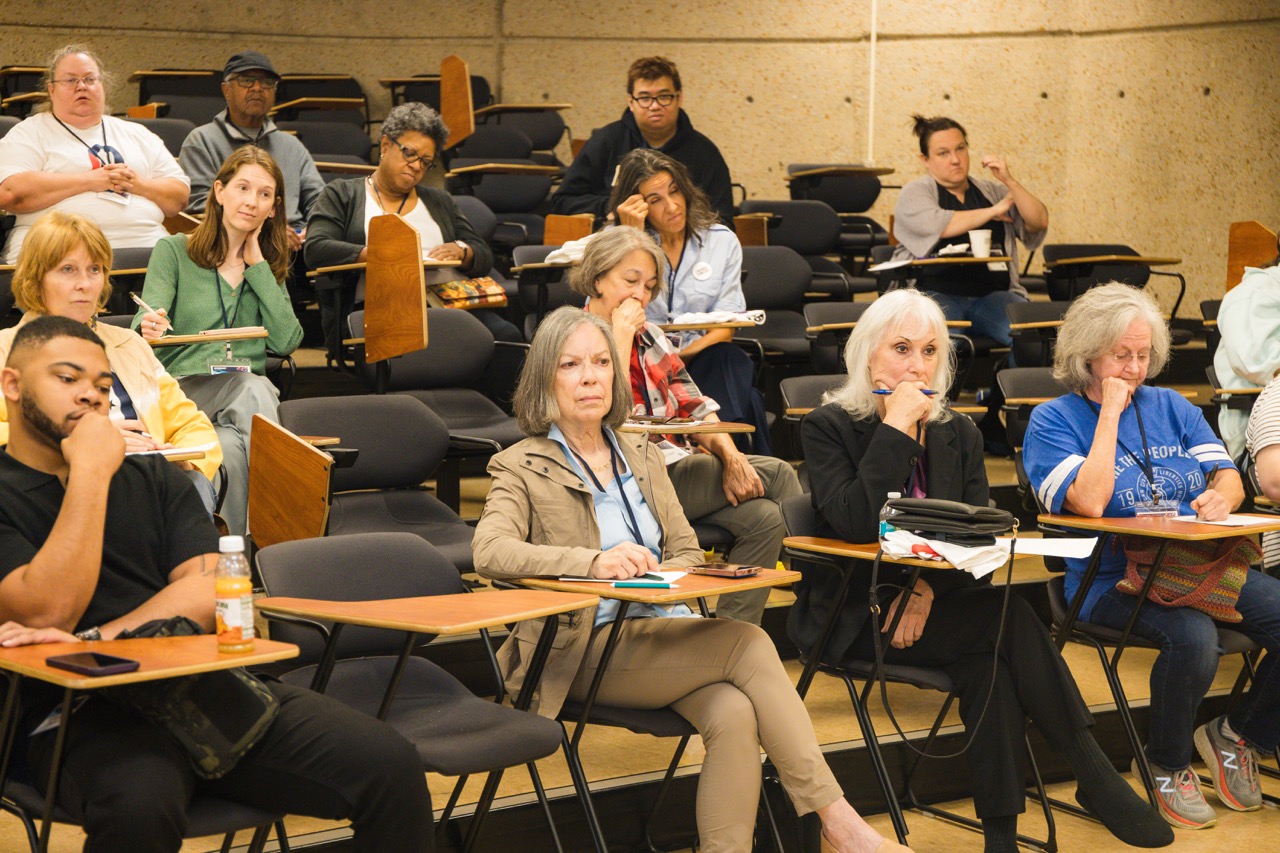 A group listening together during a training